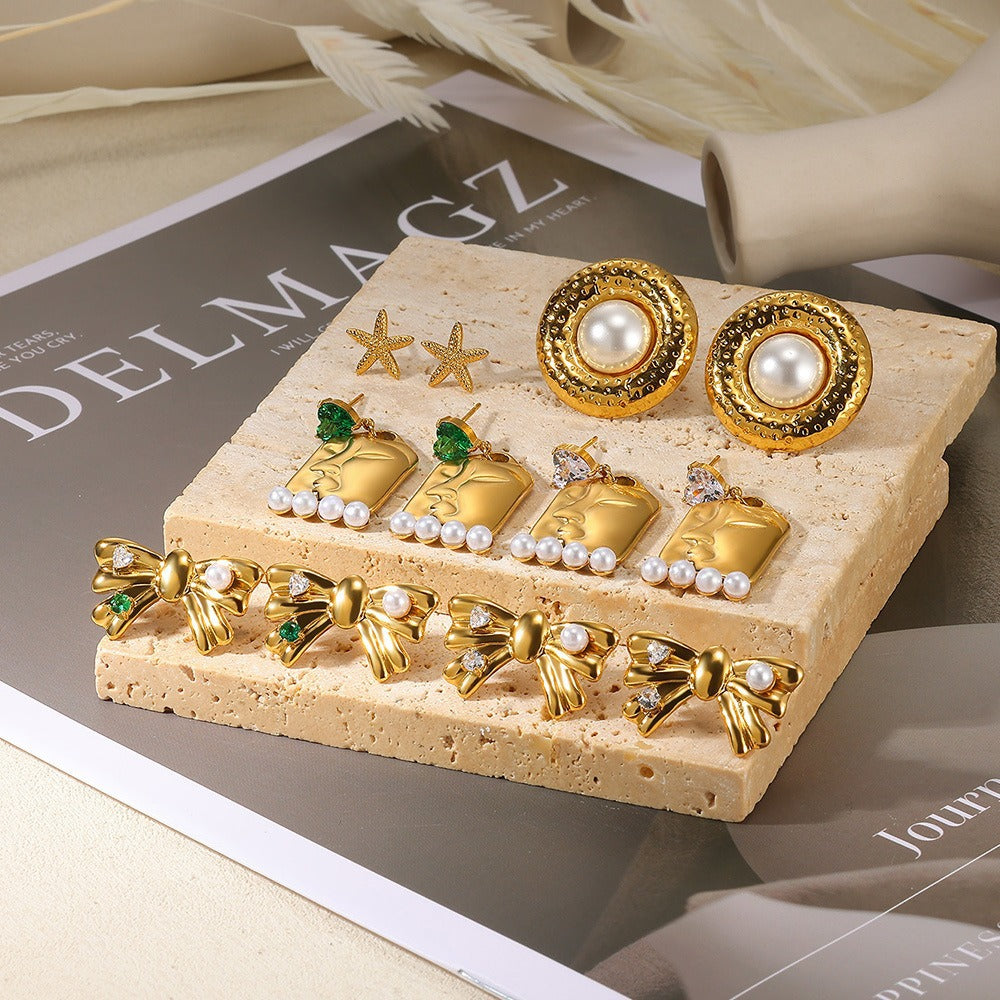 Wholesale Stainless steel man-made pearl bow heart earrings