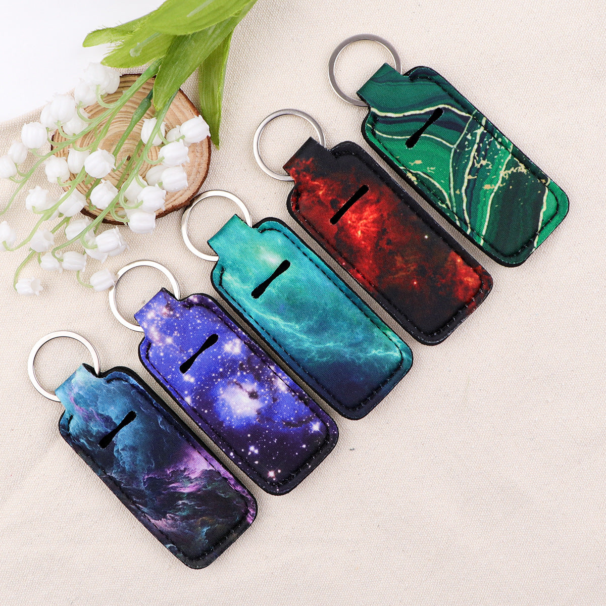 Wholesale 6pcs Creative pattern starry sky lipstick set keychain