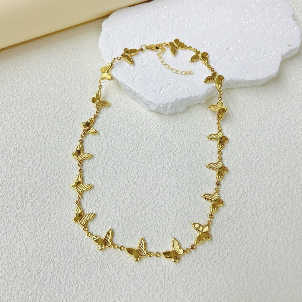 Wholesale  stainless steel three-dimensional hollow butterfly bracelet necklace suit