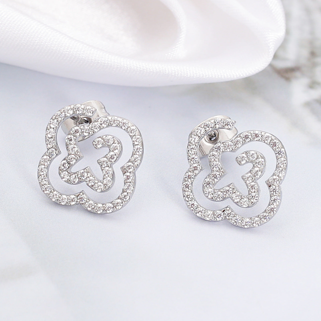 Wholesale Stainless steel earrings with zircon settings