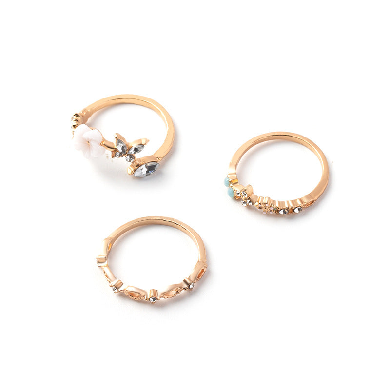 Wholesale fashion alloy opening colored diamond flower hollow ring suit