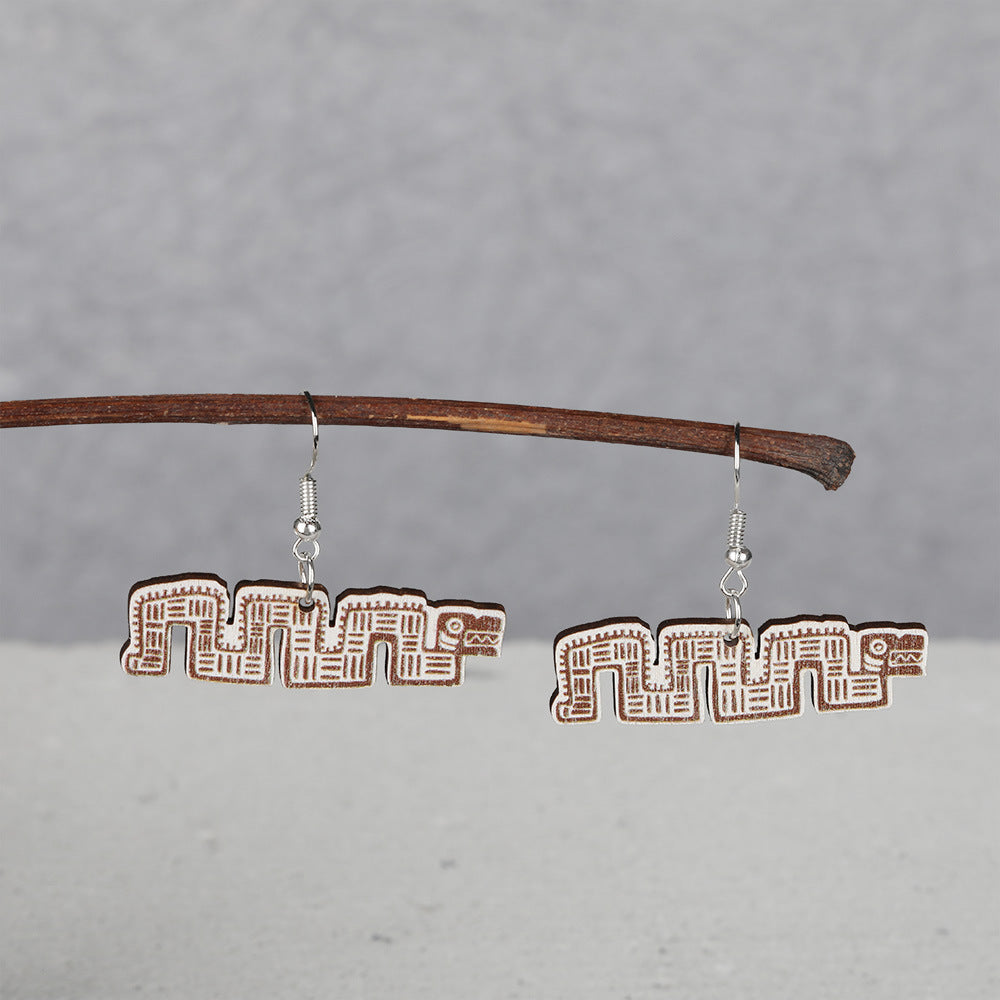 Wholesale wooden animal and Mayan image earrings
