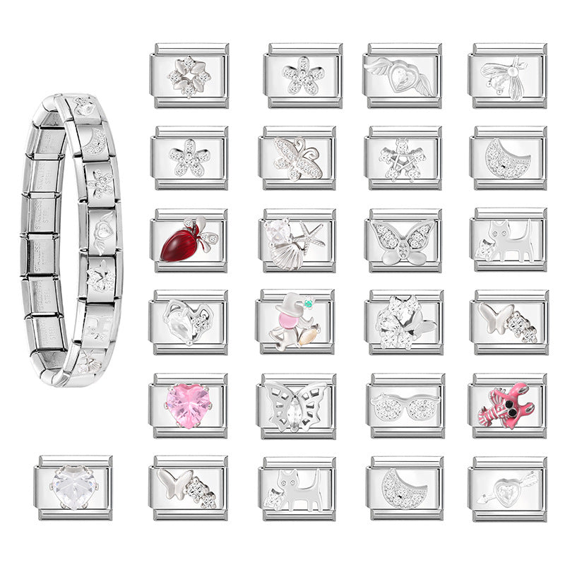 Silver modular Italian charm bracelet with floral, butterfly, heart and crystal-style links arranged alongside it