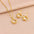 Wholesale Light Luxury Retro Zircon Inlaid  Pearl Pendant Titanium Steel Necklace Earrings Jewelry suit