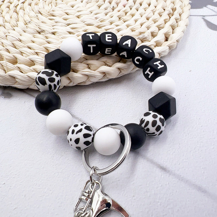 Wholesale Black And White Alphabet Bead Tassel Keychain Bag Charm For Teacher S Day Gift