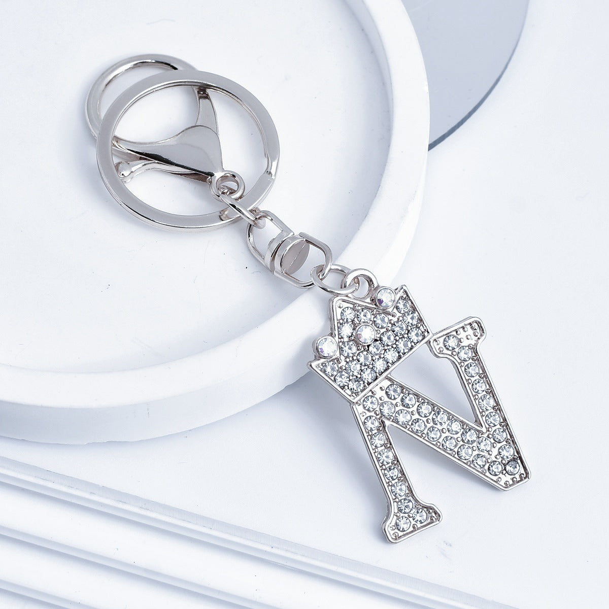 Wholesale Stylish Rhinestone 26 Letter Keychain Zinc Alloy Silver Metal Pendant Car Backpack Accessory Fashion Jewelry Gift For Resale