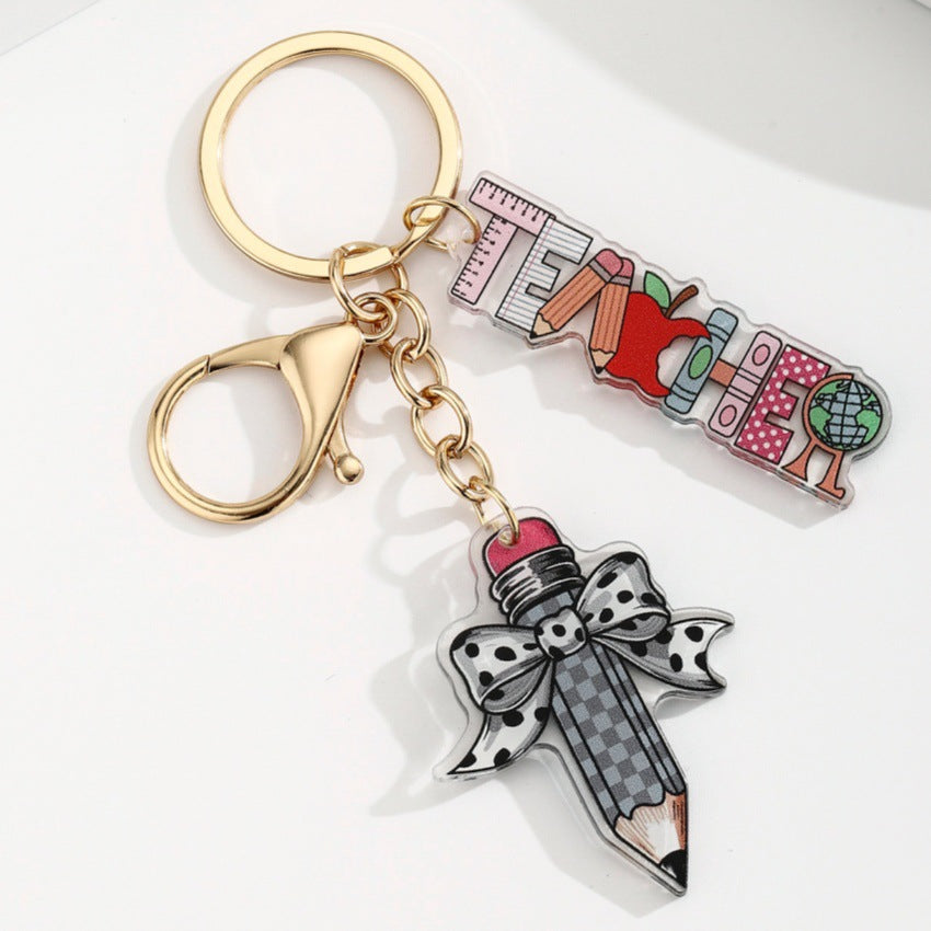 Wholesale acrylic bow pencil letter strip keychain pendant