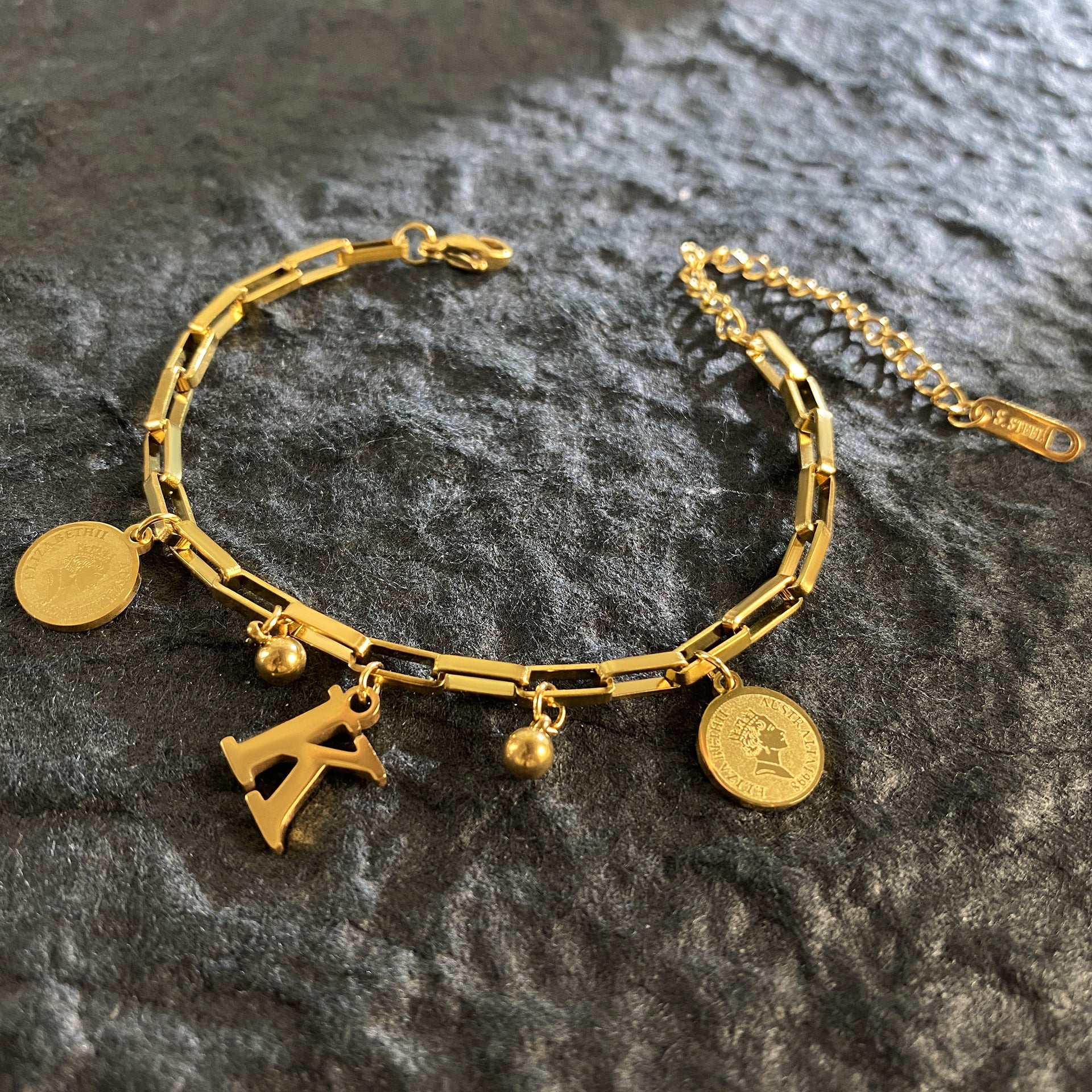 Wholesale Titanium Steel 18K Gold Plated Queen's Head Letter Bracelet ACC-BT-YuXun007