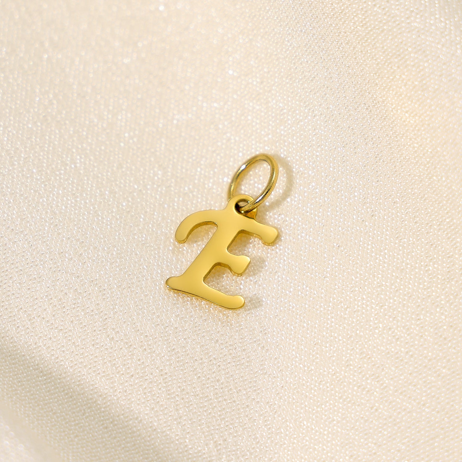 Wholesale 26 English letters stainless steel letter pendant