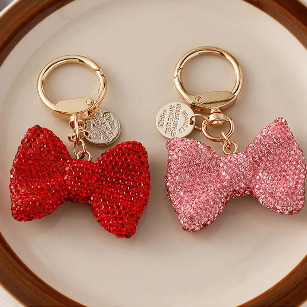 Wholesale Metal keychain with full rhinestone butterfly and bowknot pendant