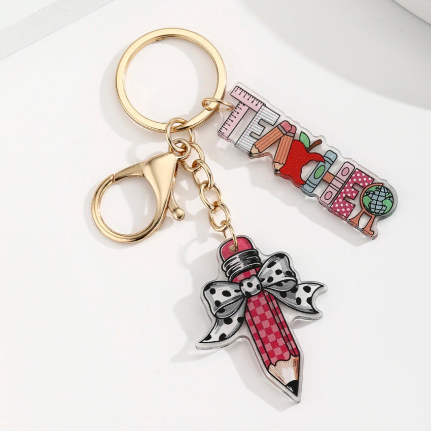 Wholesale acrylic bow pencil letter strip keychain pendant