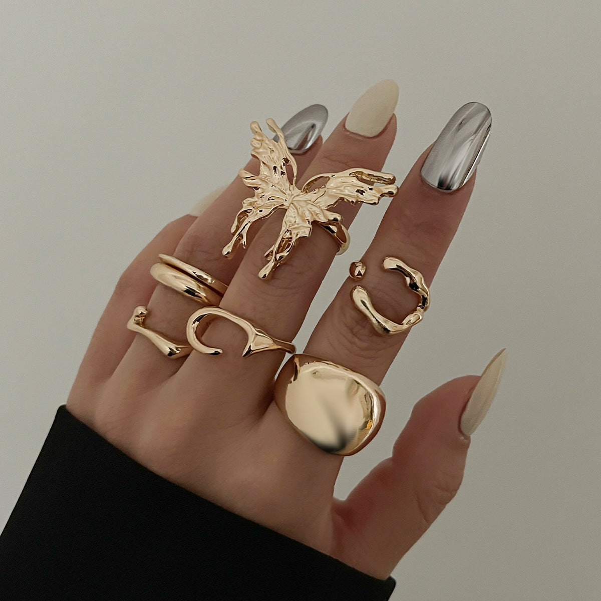 Wholesale Butterfly smooth liquid irregular alloy ring set