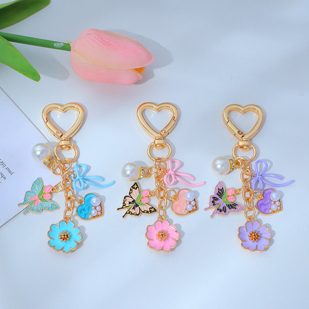 Wholesale Enamel Butterfly Flower Keychain with Pearl Pendant - Trendy Car Key Accessory
