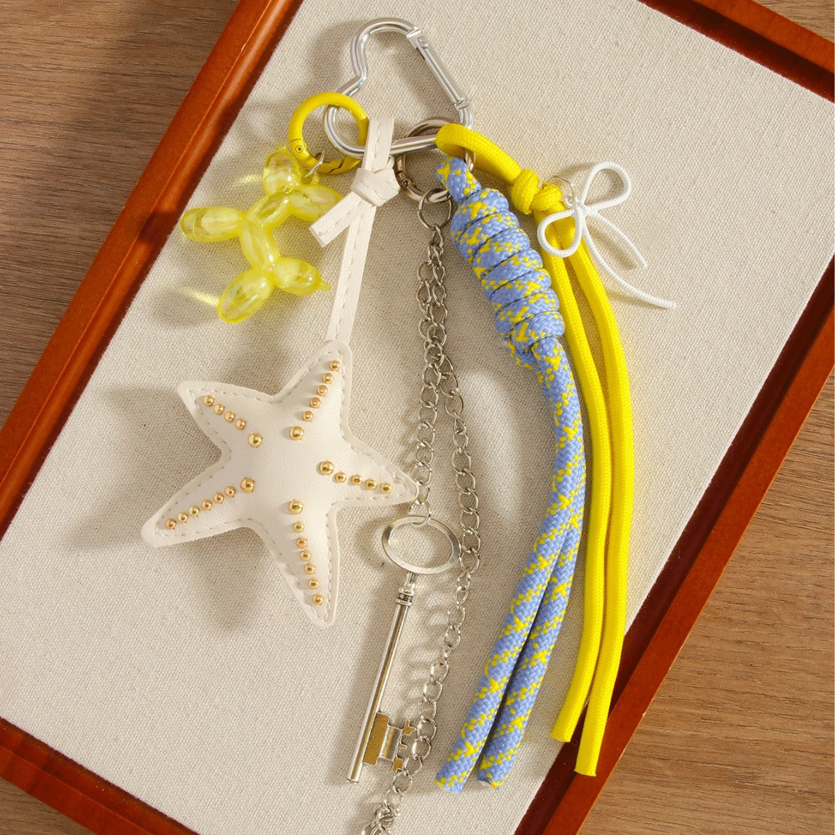 Wholesale PU leather starfish tassel balloon dog woven rope keychain