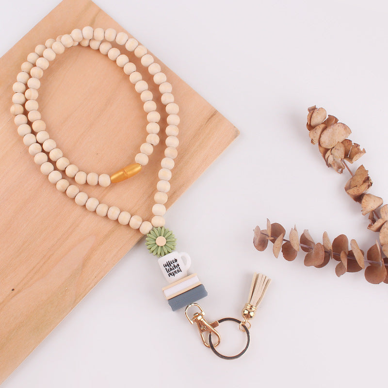 Wholesale Wooden Bead Necklace Keychain Silicone Daisy Book Beaded Tassel Necklace