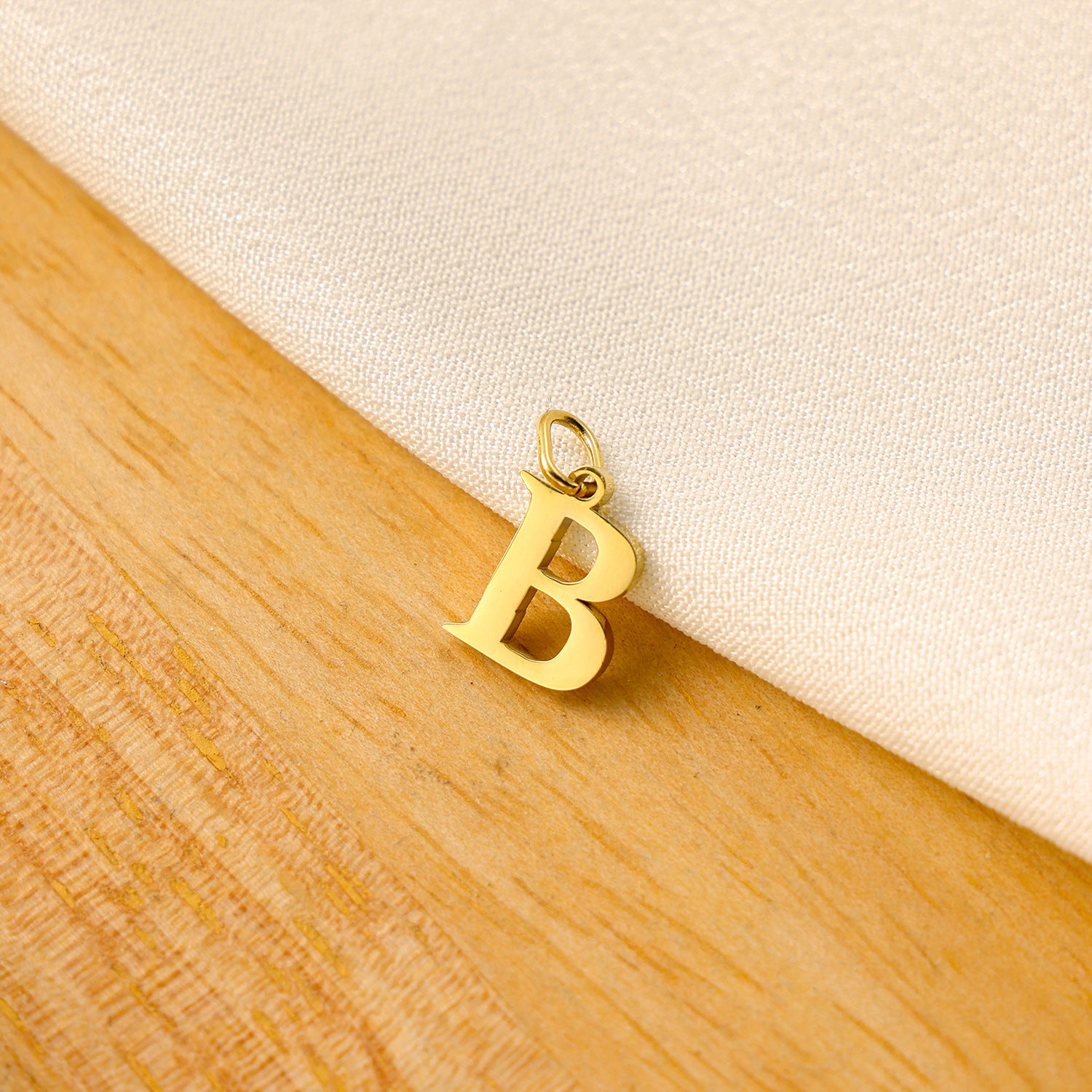 Wholesale Titanium steel letter pendant