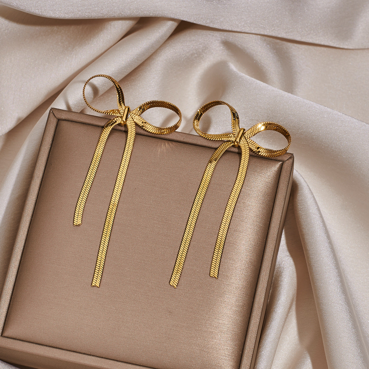 Wholesale Stainless Steel Earrings Tassel Snake Bone Chain Bow Earrings ACC-ES-Hongx001