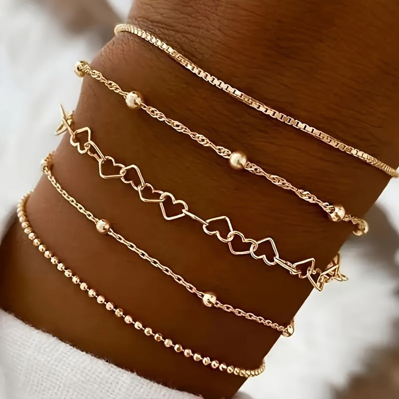 Wholesale Gold Tone 12 Piece Bracelet Set With Airplane Pearl Heart Designs Trendy Resale Jewelry Accessory