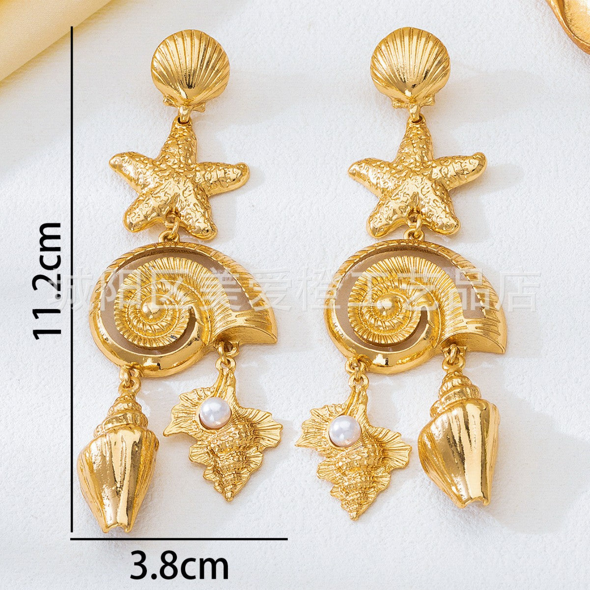 Wholesale Ocean-themed alloy earrings jewelry pendants light luxury and high-end gold color