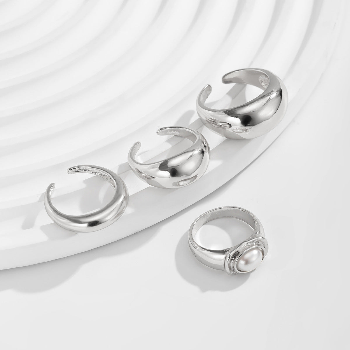 Wholesale Inlaid smooth irregular alloy ring set