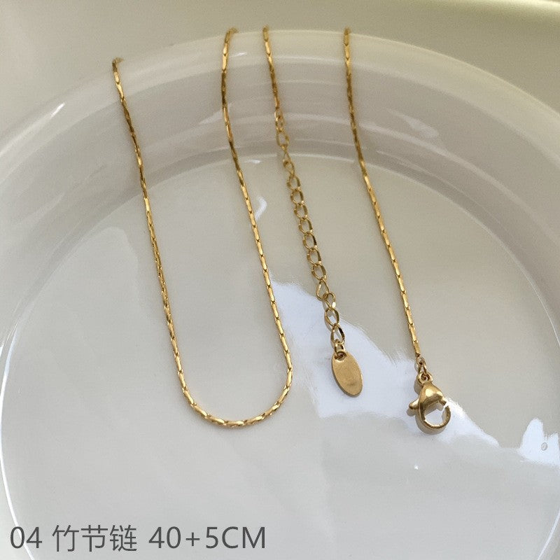 Wholesale Cross chain box chain snake bone chain titanium steel plated 24k golden sunflower clavicle chain