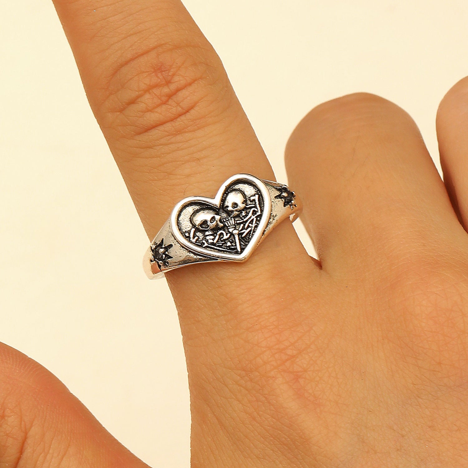 Wholesale heart double skull starburst open ring