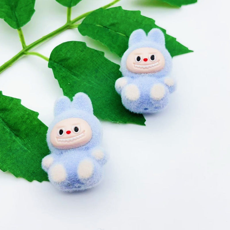 Wholesale 10pcs cartoon flocking sitting doll with beads