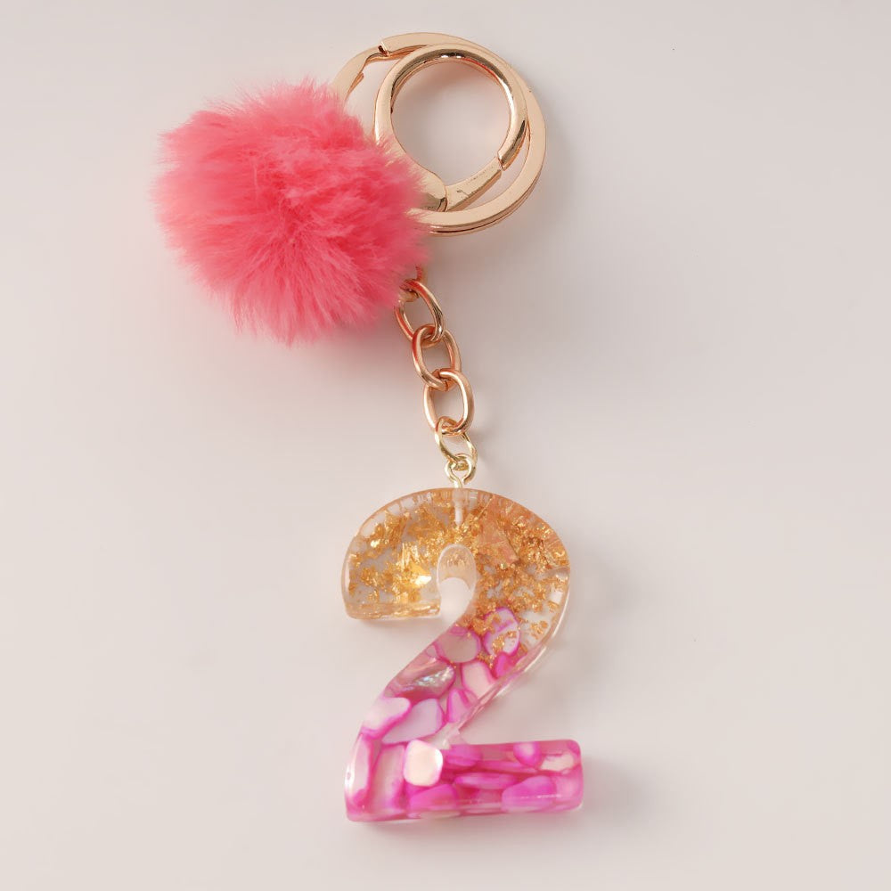 Wholesale Creative and Cute Red Fur Ball Letter Shell Handmade Glue Keychain Exquisite Pendant