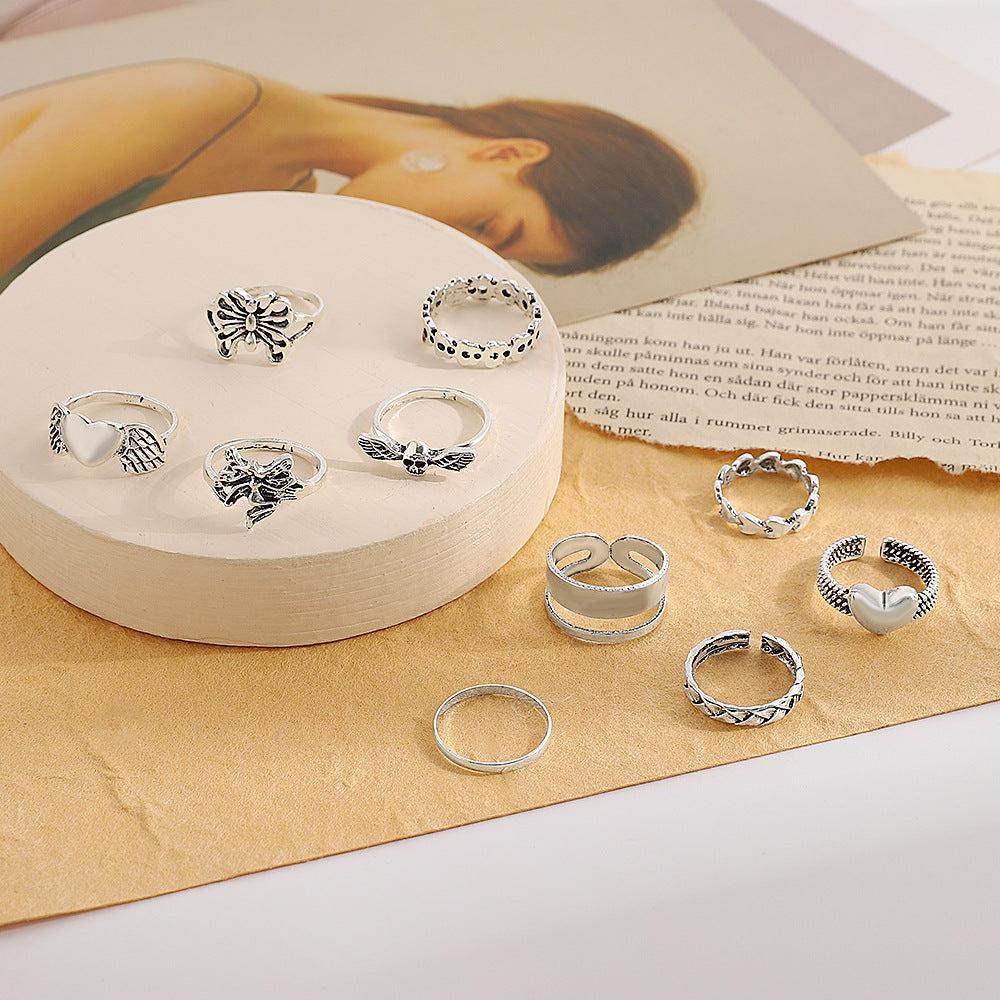 Wholesale love hollow butterfly ancient silver joint ring