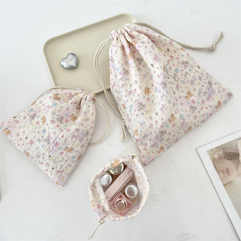 Wholesale Trendy Cartoon Embossed Drawstring Makeup Pouch Small Polyester Cosmetic Storage Bag Dustproof Portable Organizer Fashion Accessory