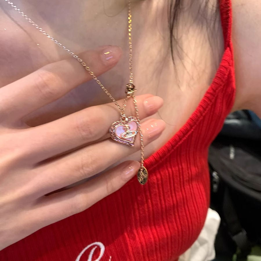 Wholesale New Niche Pink Heart Saturn Necklace for Women,  Ins-Style Light Luxury Design,  Long Clavicle Chain,  Student Version Choker