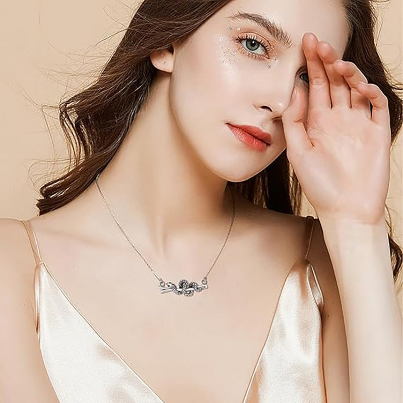 Wholesale  Retro Snake-shaped Winding Diamond Dropping Oil Necklace