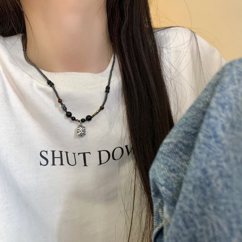 Wholesale Lion Awakening Titanium Steel Pendant Necklace Obsidian Clavicle Chain ACC-NE-Ziyou012