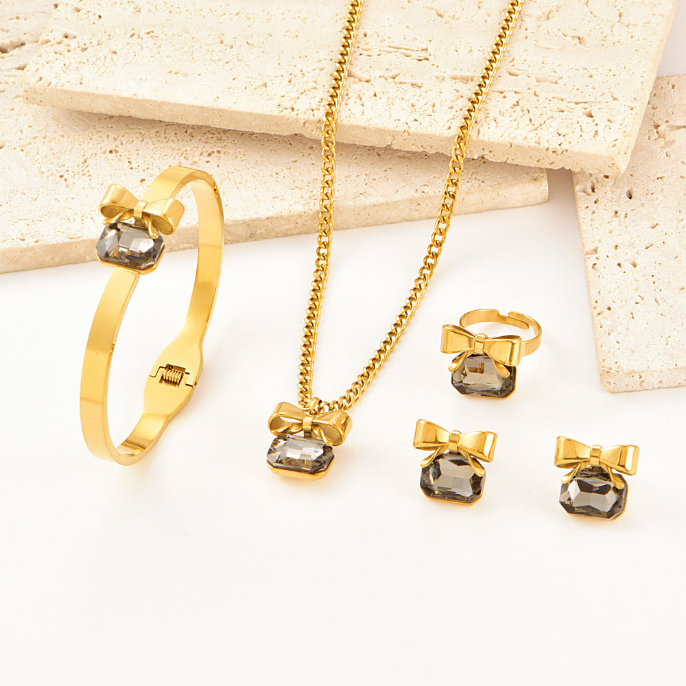 Wholesale Stainless Steel Bow Rhinestone Necklace,  Bracelet,  Earrings,  and Ring Set