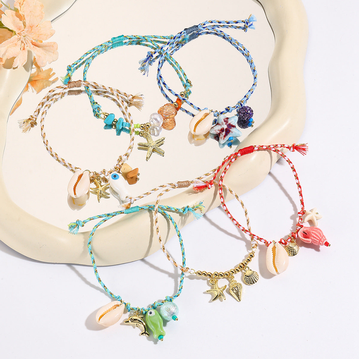 Wholesale Woven bracelet ceramic starfish shell small fish pendant colored rope bracelet