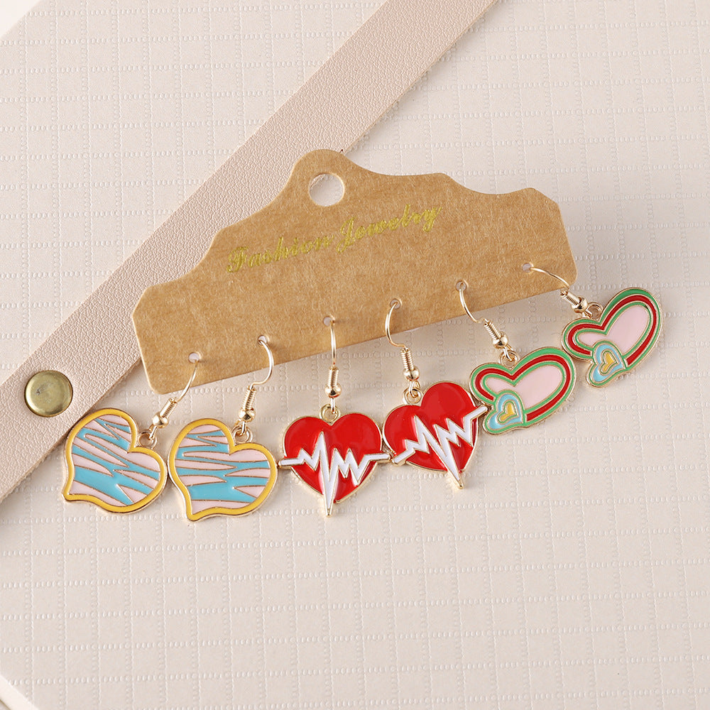 Wholesale Valentine' s Day Love Bear Rose Church Love Heartbeat Pendant Oil Dropping Earrings suit