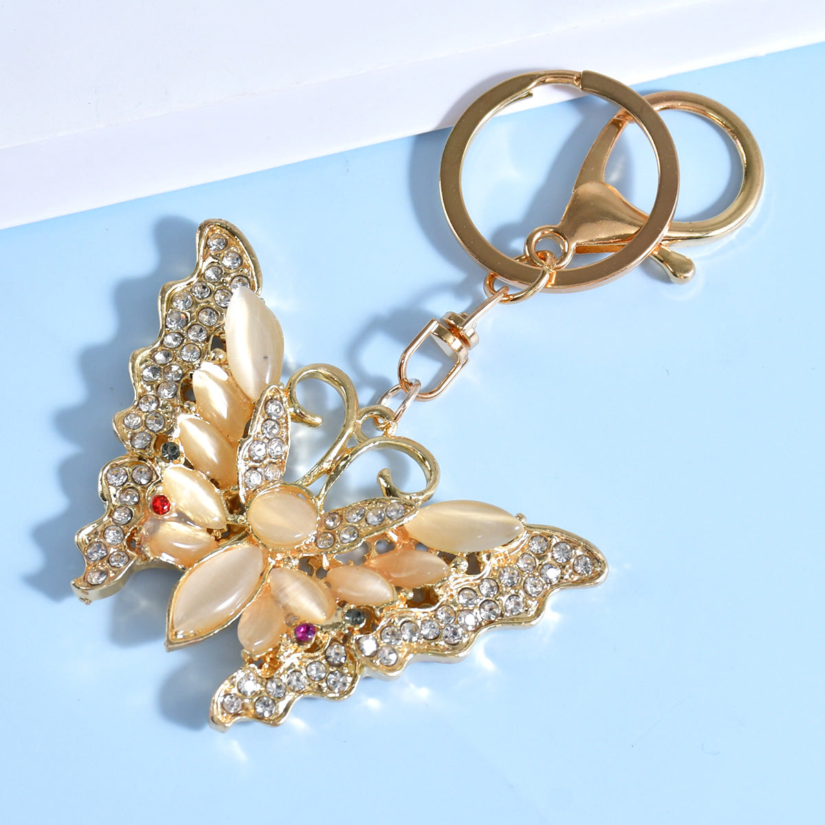 Wholesale Butterfly Cat Eye Keychain Gold Zinc Alloy Birthday Gift Car Backpack Charm Boutique Resale Keyring