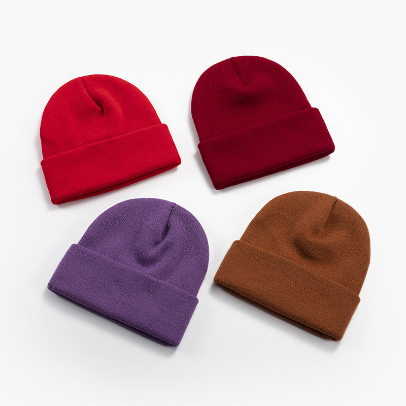 Wholesale light plate knitted cold cap acrylic solid color wool cap