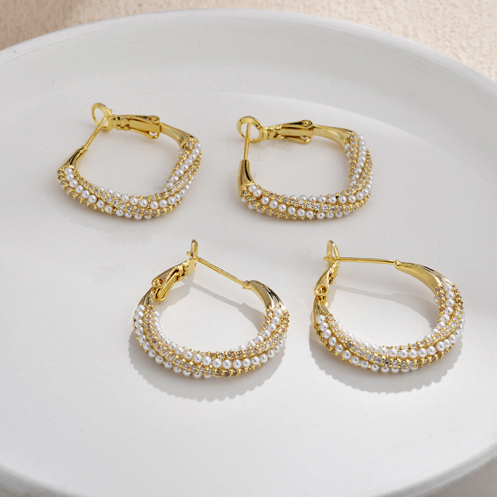 Wholesale Pearl inlaid with diamond twisted circular hoop earrings