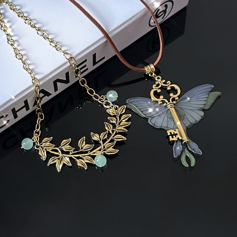 Wholesale Spice Butterfly Key Pendant Necklace Maillard Brown Retro Double-layer Necklace High-grade Leather Clavicle Chain Trendy