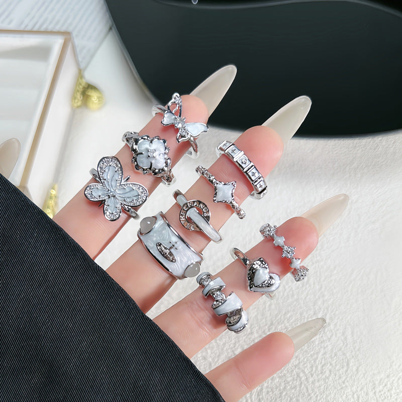 Wholesale White Drop Glaze Butterfly Saturn Fashion Ring