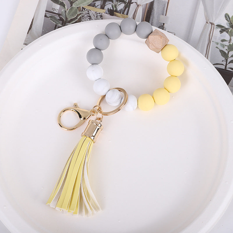 Wholesale Trendy Silicone Bead Bracelet With Tassel Wooden Bead Keychain Natural Geometry Style Chic Jewelry Accessory Gift