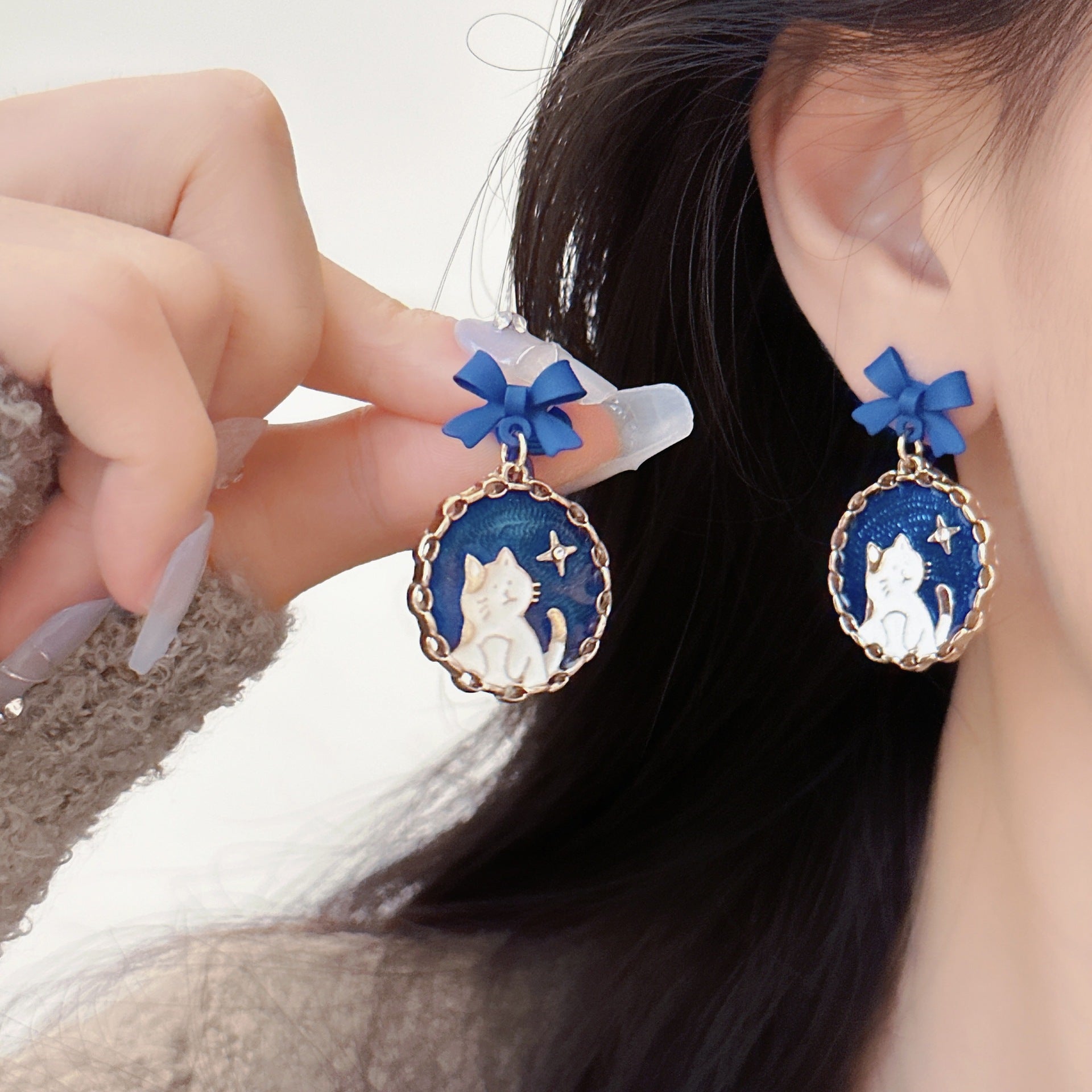 Wholesale blue bow cat earrings