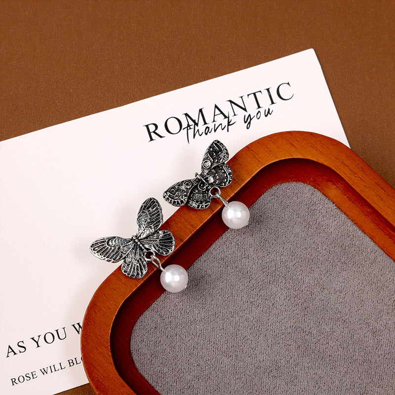 Wholesale Vintage Metallic Asymmetric Butterfly Pearl 925 Silver Needle Earrings ACC-ES-ZhiShifang005