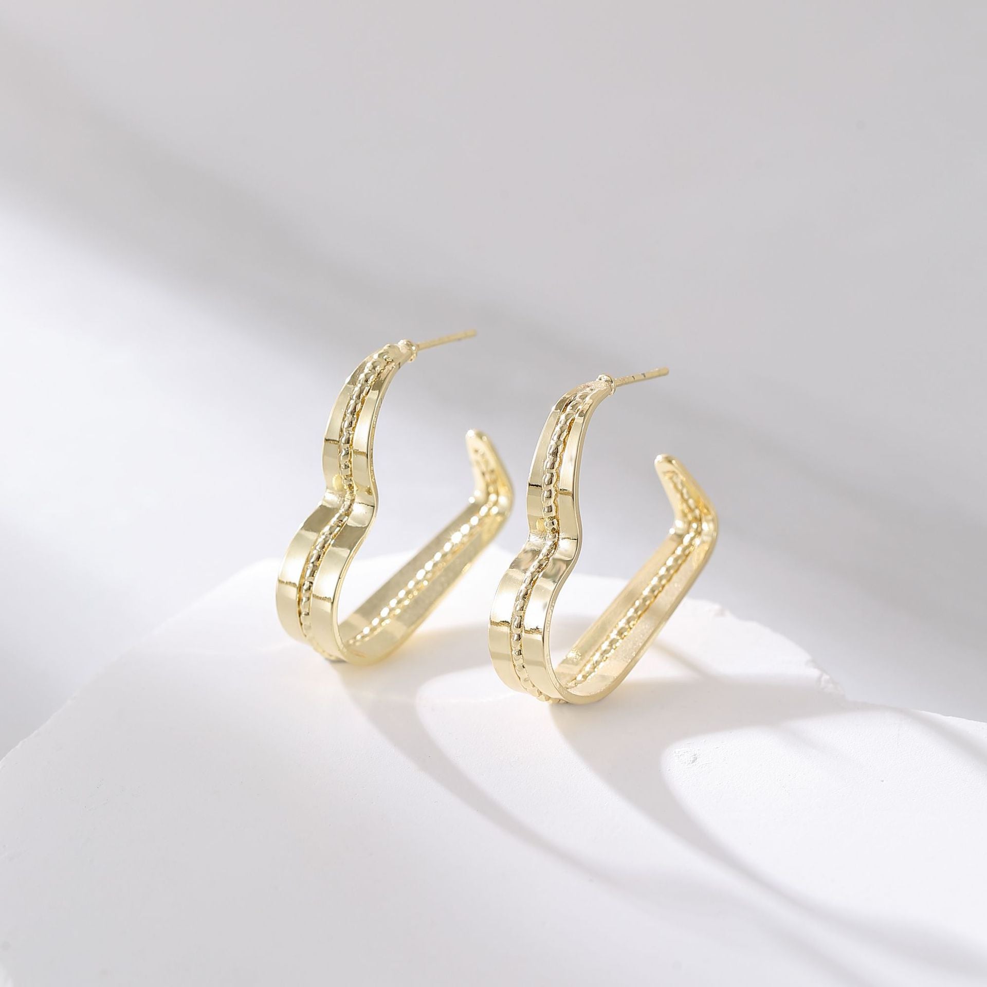 Wholesale copper plated gold inlaid zircon love earrings