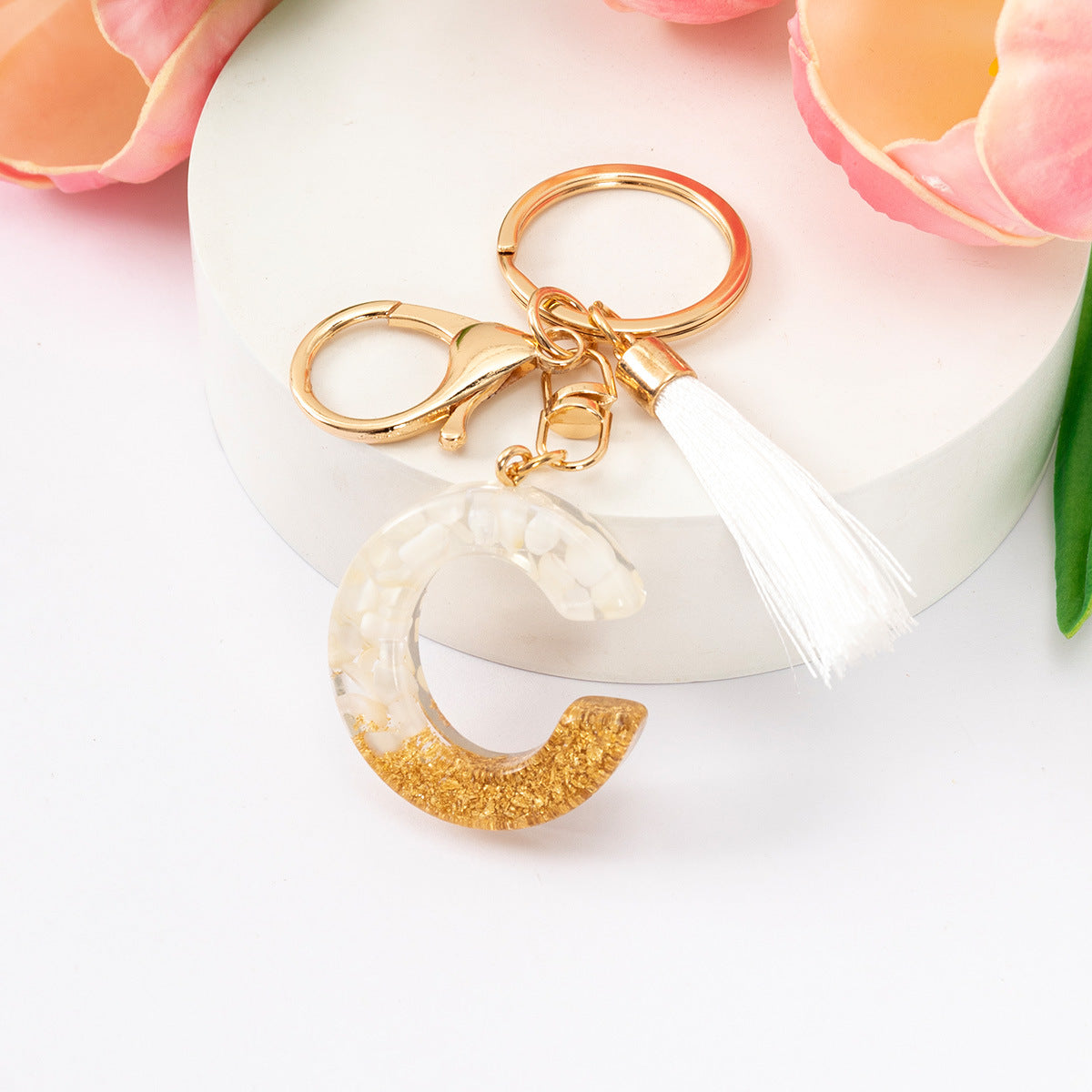 Wholesale Gold Foil New Resin Crystal Glue White Tassel Color English Digital Keychain