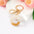 Wholesale Gold Foil New Resin Crystal Glue White Tassel Color English Digital Keychain