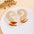 Wholesale Retro Flower Pearl Hollow Love Light Luxury Earrings