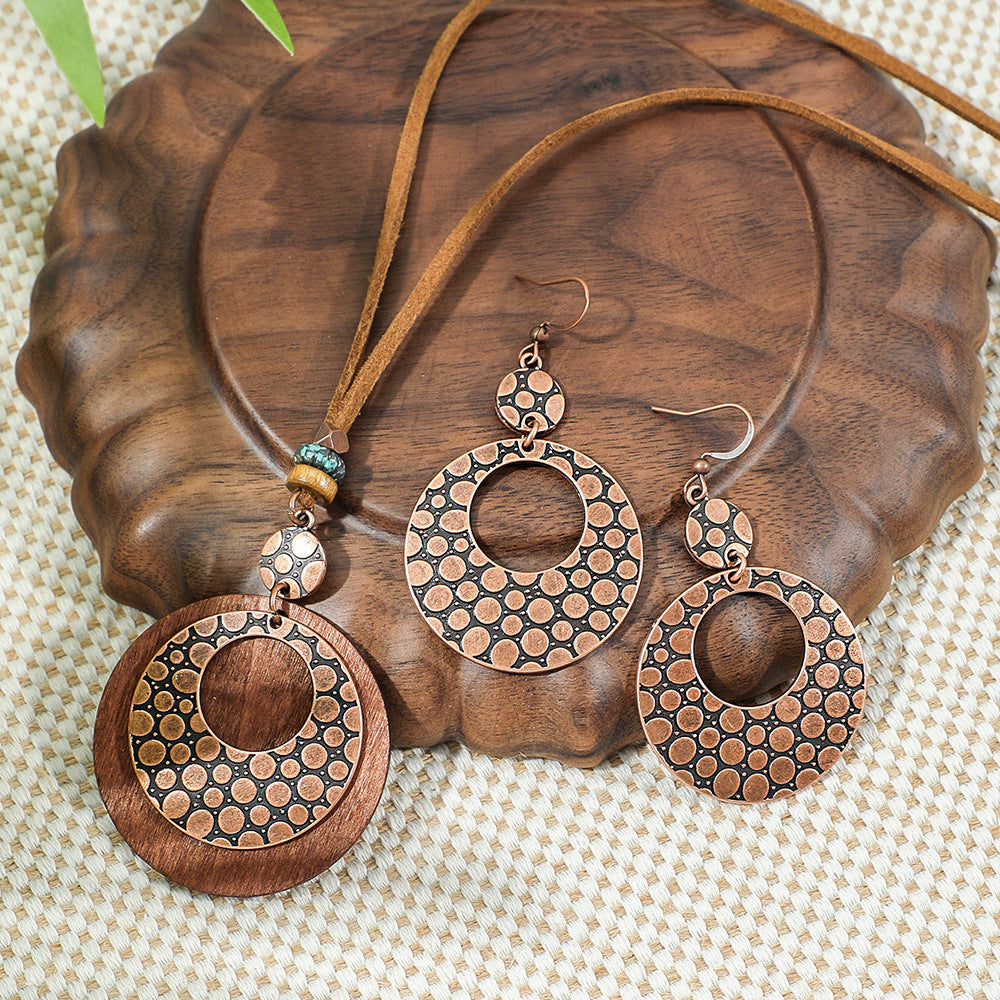 Wholesale Retro Bohemian Alloy Electroplated Jewelry Set Round Hollow Earrings Long Necklace Party Wear