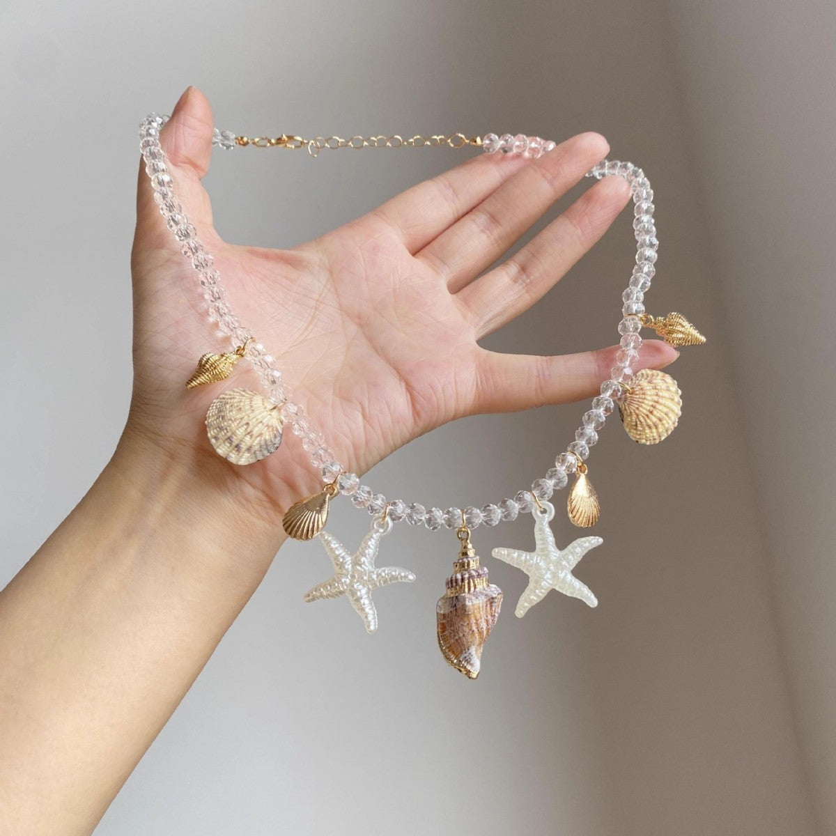 Wholesale starfish conch and seashell necklace